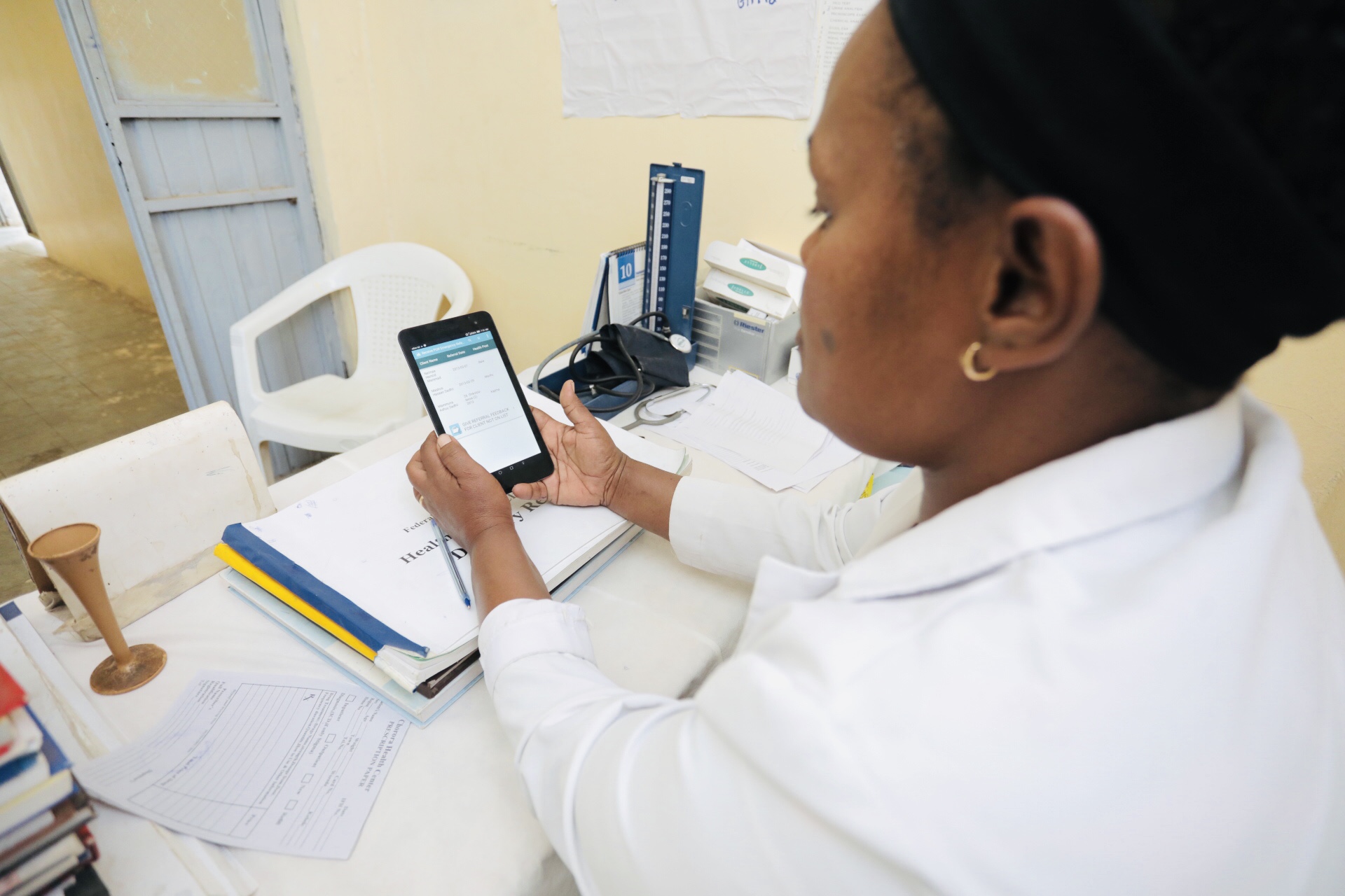Nurse at the Chorora Health Center, Orommia Region, using the electronic Community Health Information System (eCHIS).